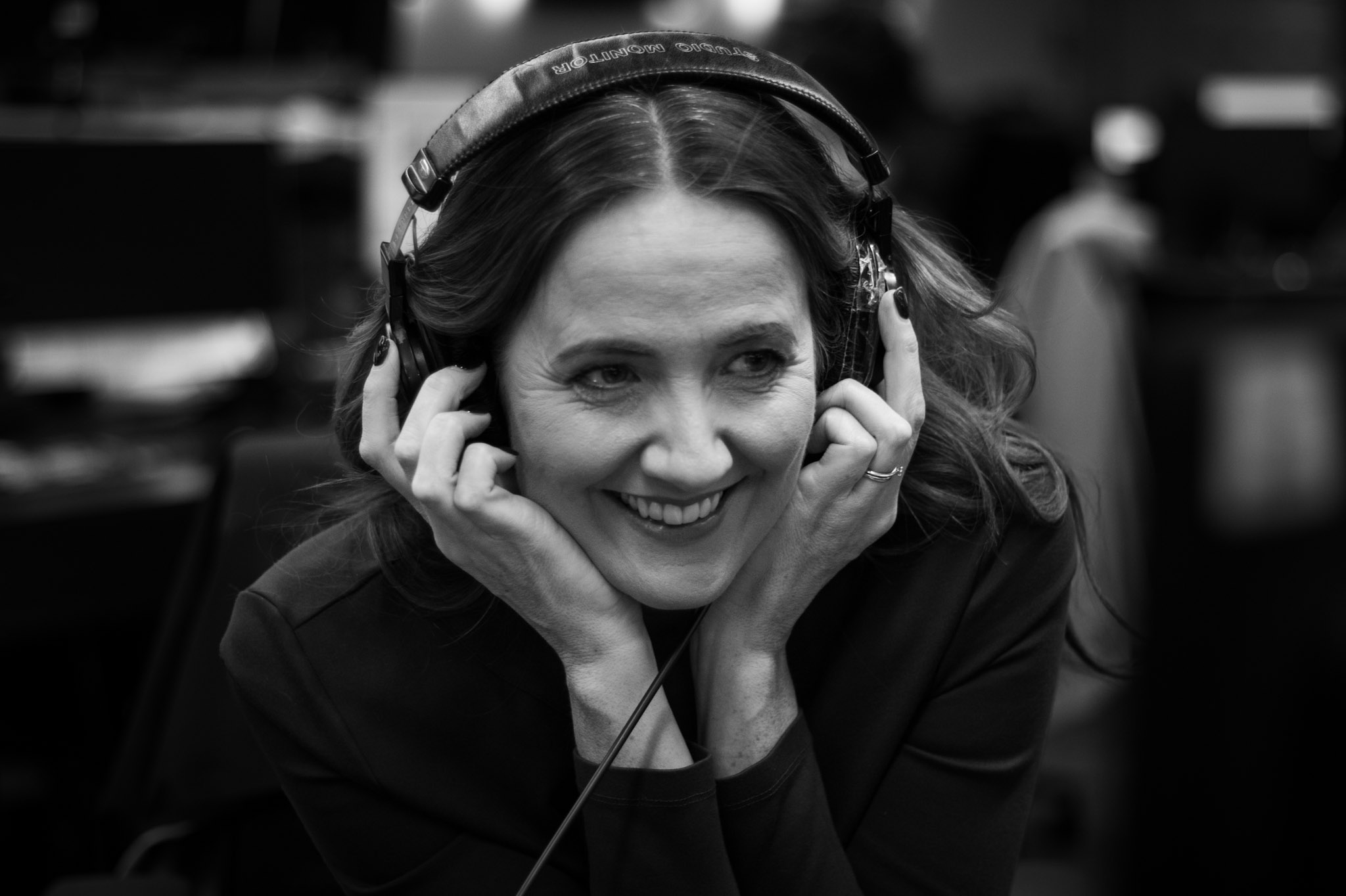 BBC news presenter Laura Miller watches her colleagues at work